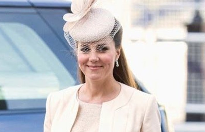 Pregnant Kate Middleton glows in nude dress