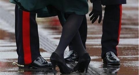 William helps Kate out of a grate